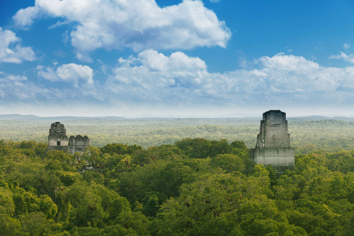 View of the jungle and the Mayan temples of Tikal in Guatemala